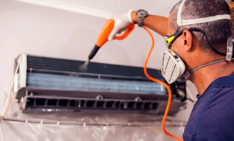 Water jet cleaning a building wall in Dubai